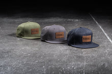 Load image into Gallery viewer, NOBULL FLAT-BRIM SNAPBACK